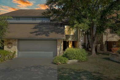 Traditional-style house featuring stone siding, c