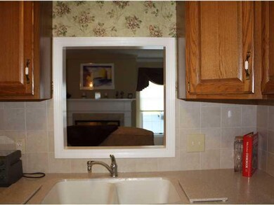 Kitchen. Corian counters & sink, and custom cerami