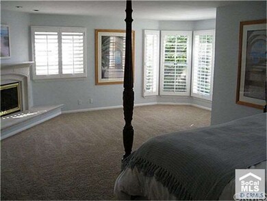 Spacious Master Suite with fireplace and lots of w