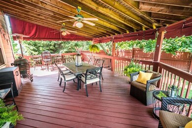 Covered Deck. Also included is the hot tub
