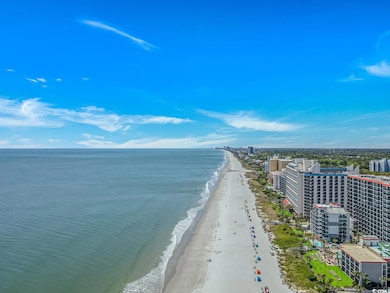 Property view of water featuring a beach view