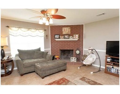 Living Room. wood-burning fireplace in living room