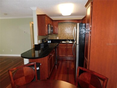 Beautiful kitchen with wood cabinets and granite c