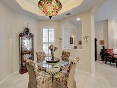 Formal Dining room with tray ceiling, crown moldin