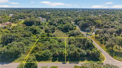 Aerial overview of property's location featuring property boundaries highlighted