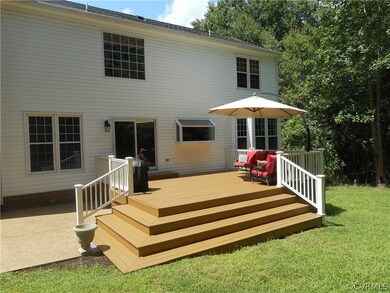 Tiered deck in the rear of the house w/aggregated