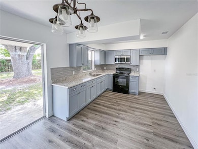 8639 Fish Lake Rd, Tampa, FL 33619 - photo 5