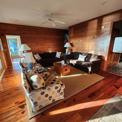 Living room featuring hardwood / wood-style floori
