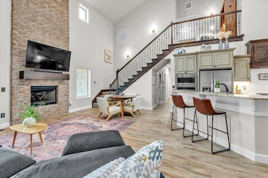 Living room with a fireplace, ceramic wood plank f