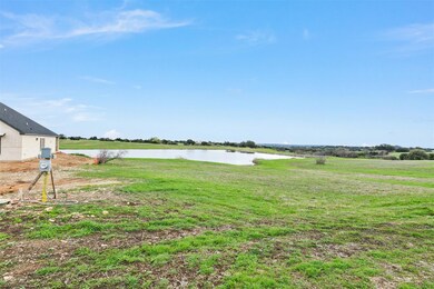 View of yard featuring a water view and a rural vi