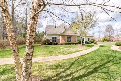 Wooded area behind home affords privacy