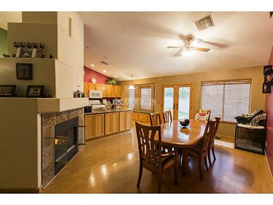 Family Room. GRANITE SURROUND ON THE 2-WAY FIREPLA