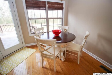A CASUAL EATING SPOT OVERLOOKING THE DECK!  THIS HOME ALSO OFFERS A FORMAL DINING ROOM FOR THE LARGER GATHERINGS OF FAMILY AND FRIENDS!