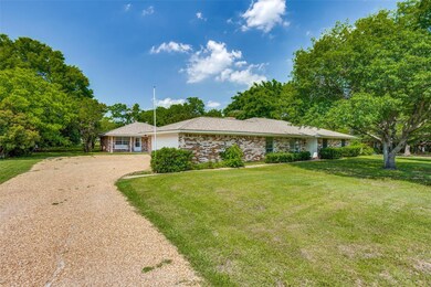 Ranch-style house with a large front yard