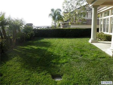 Large Backyard with lush, green grass, & with ocea
