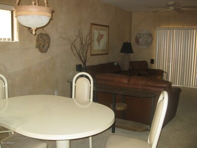 DINING ROOM LOOKING INTO GREAT ROOM