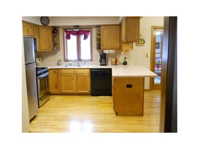 Kitchen. Kitchen is warm oak, with oak floors, eat