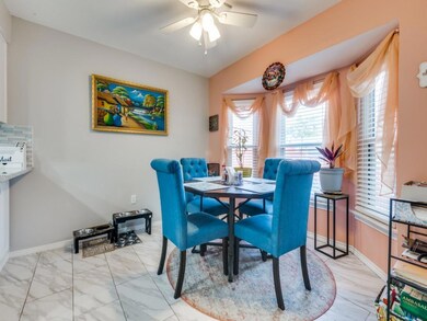 Dining room featuring marble finish floor, a ceili