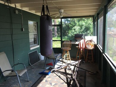 358 Carport converted to screen room