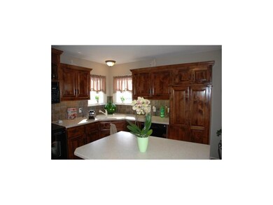 Kitchen with view to field. Pantry space.