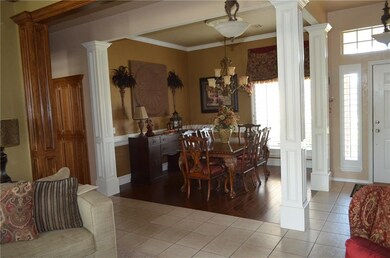 Formal Dining room is 12'X11' with wood floor and 