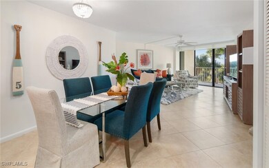 Dining space featuring light tile patterned floors and ceiling fan