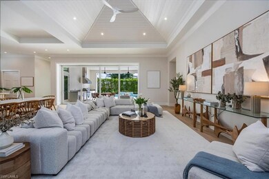 The open concept main living area features a vault