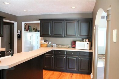 Kitchen with plenty of cabinets also has an eat in area and is next to the formal Dining Room