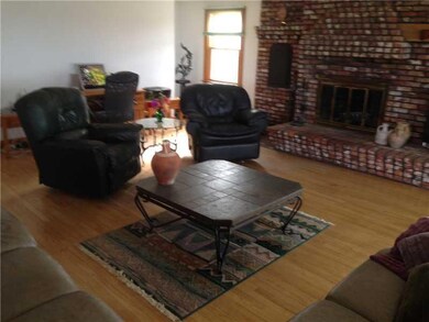 Living Room. with brick fireplace