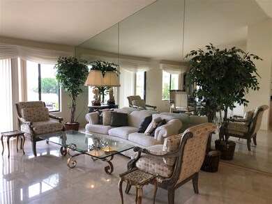 Vaulted ceilings, marble flooring, mirrors on wall