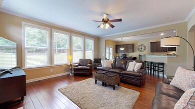 Watch the big game from your den and even the kitchen guests can view too