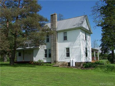Exterior Back. 3rd porch in rear of house.