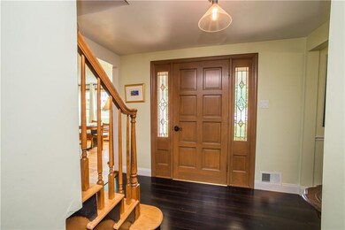 The entire first floor features gorgeous newer or 