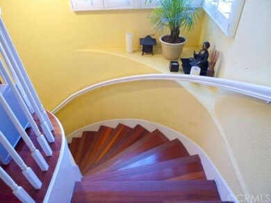 Spiral staircase leads up to unit