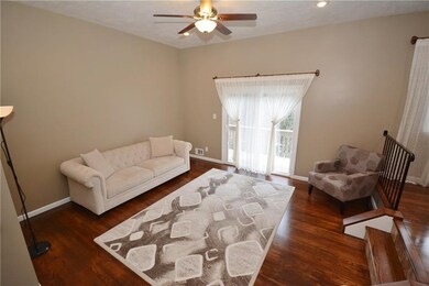 Sliding doors off the living room open to the uppe