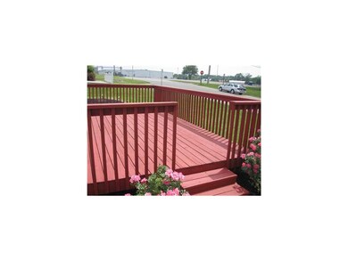 Front Exterior. Freshly Stained Deck