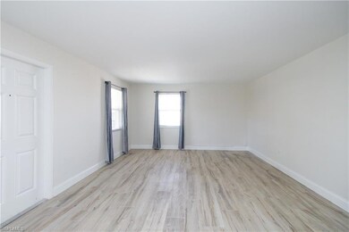 Spare room with light hardwood / wood-style floors