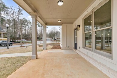 View of patio featuring covered porch