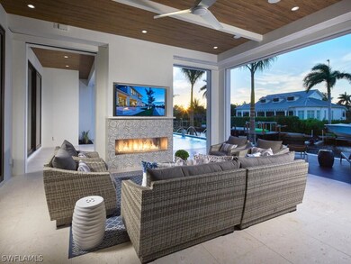 Patio terrace at dusk with ceiling fan and an outd