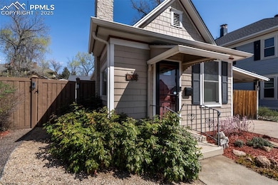 View of front of property featuring cooling unit, 