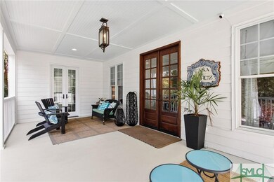 Large covered front porch. You will be amazed as s