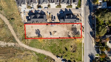 Aerial overview of property's location featuring property parcel outlined