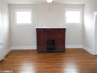 Living Room - Brick Fireplace, Ceiling Fan