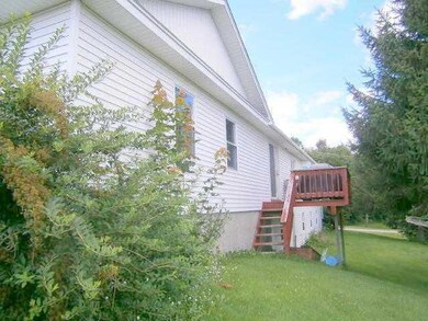 Exterior Back. Nice corner lot 1.24 acre