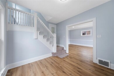 Entryway featuring wood-type flooring