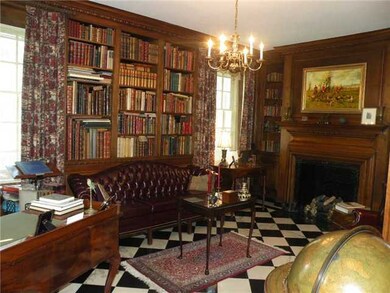 Walnut-paneled library