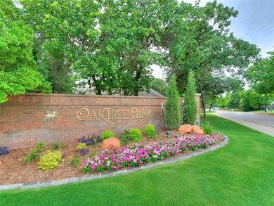 Community sign featuring a yard