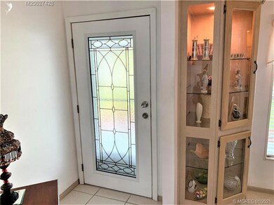 Custom entry door with leaded, etched glass
