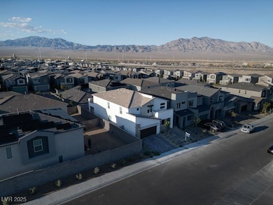 Aerial view of residential area featuring mountain