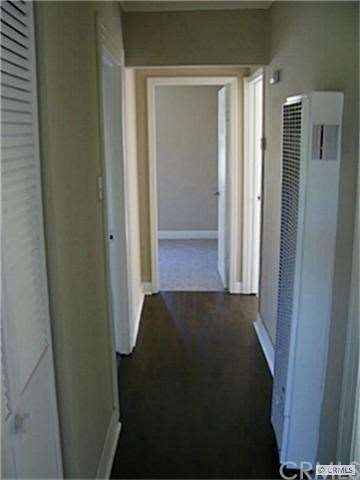 Hallway leading to 3 nice bedrooms and new wall he